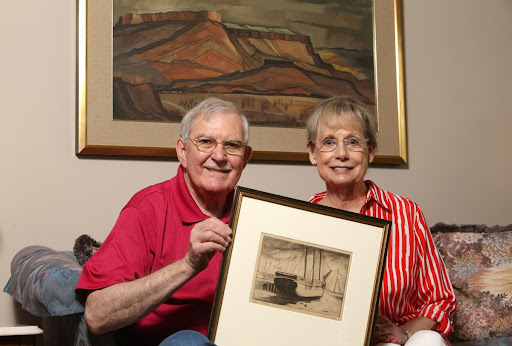 Kent and Jeanette Young with Doel Reed's work