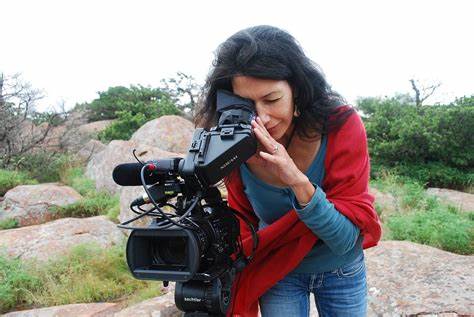 jm3.jpg Jill Momaday looking through video camera