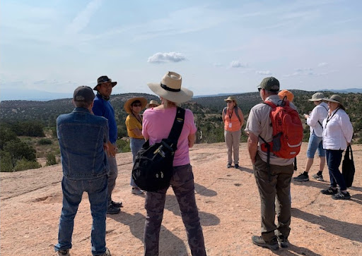 Leisure Learning group listening to tour guide on hike